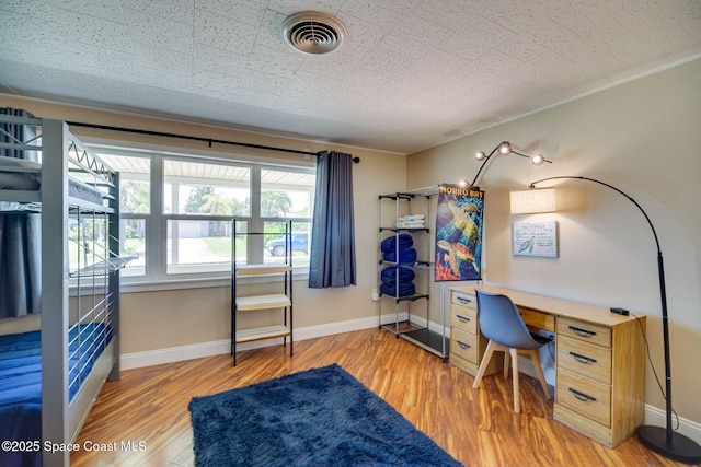 office with hardwood / wood-style floors