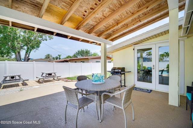 view of patio with grilling area and french doors