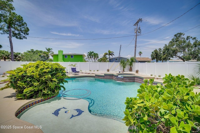 view of swimming pool featuring an in ground hot tub