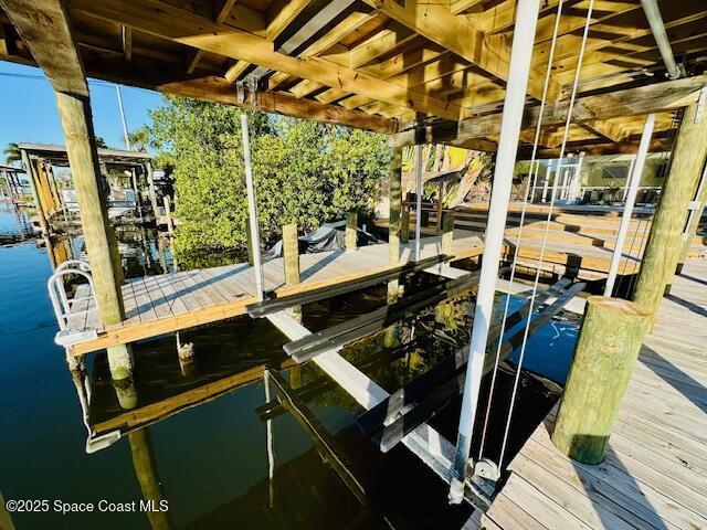 view of dock with a water view