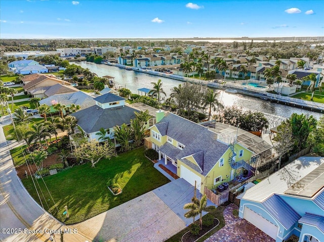 drone / aerial view featuring a water view