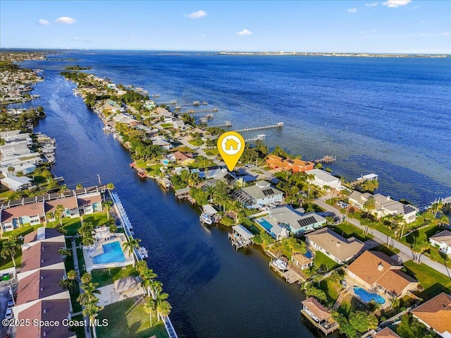 bird's eye view with a water view