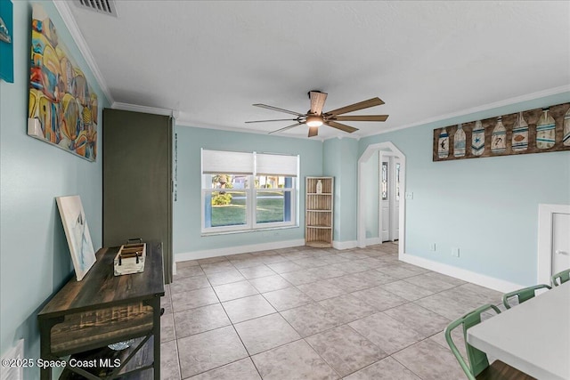 living room with crown molding, light tile patterned flooring, and ceiling fan