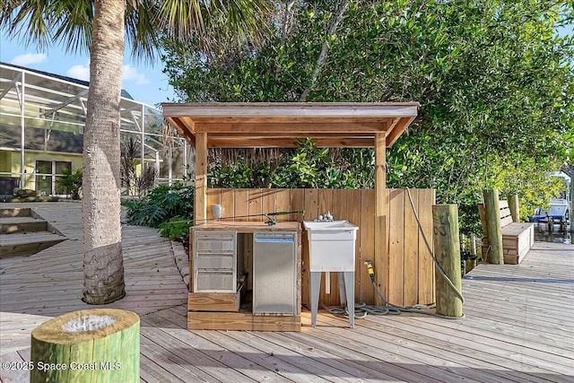 wooden deck with glass enclosure