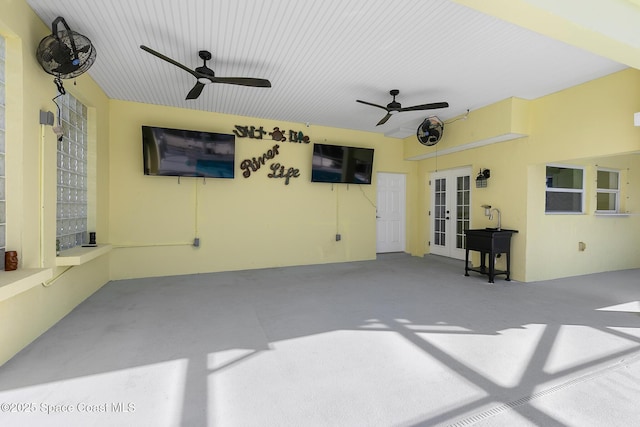 view of patio / terrace featuring french doors and ceiling fan