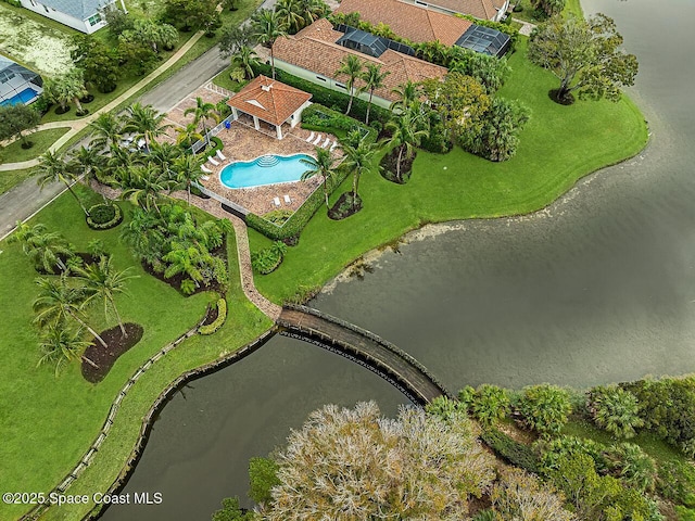 birds eye view of property featuring a water view