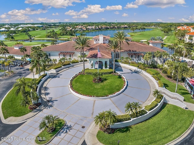 bird's eye view featuring a water view and a residential view