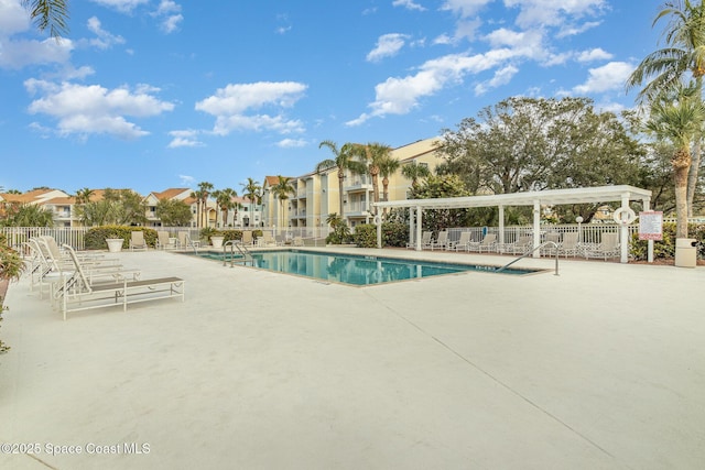 view of pool featuring a patio area