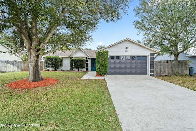 ranch-style home with a front yard and a garage