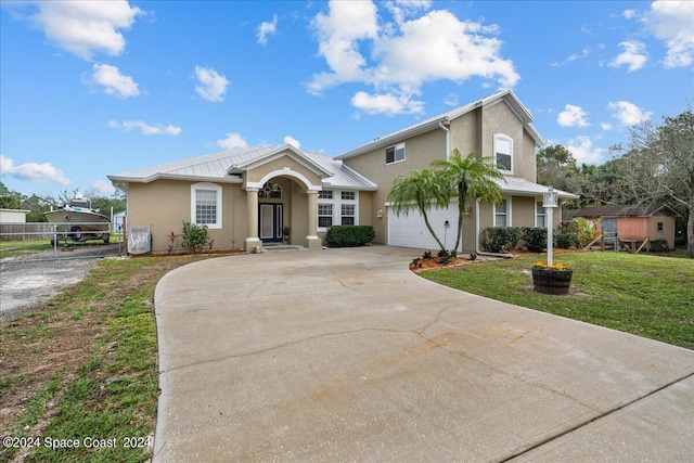 view of front facade with a front yard