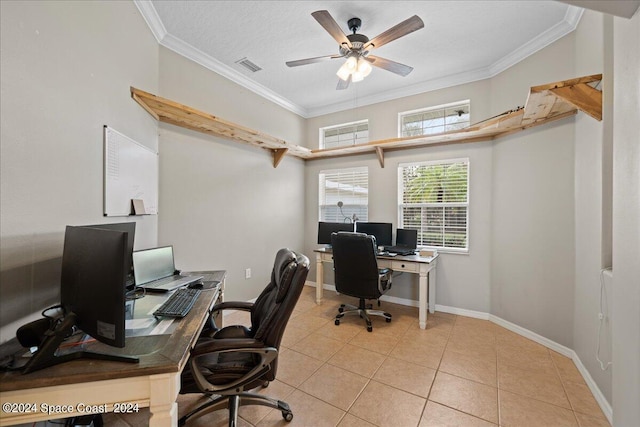 home office with light tile patterned floors, a textured ceiling, ceiling fan, and crown molding