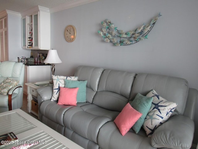 living room with crown molding