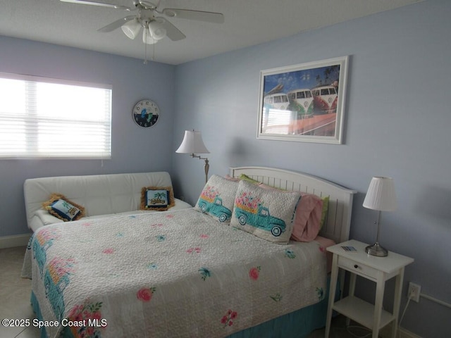 bedroom featuring ceiling fan