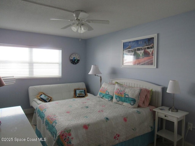 bedroom featuring ceiling fan