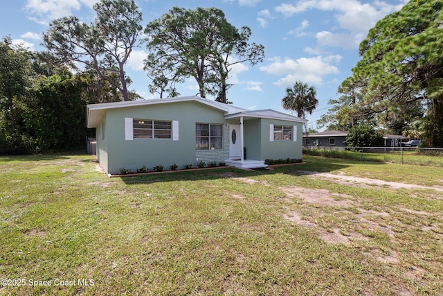 view of front facade with a front yard