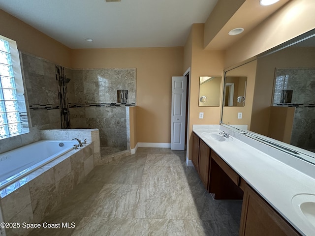 bathroom featuring vanity and plus walk in shower