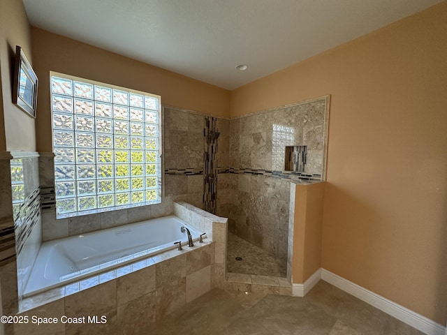 bathroom featuring separate shower and tub and tile patterned flooring