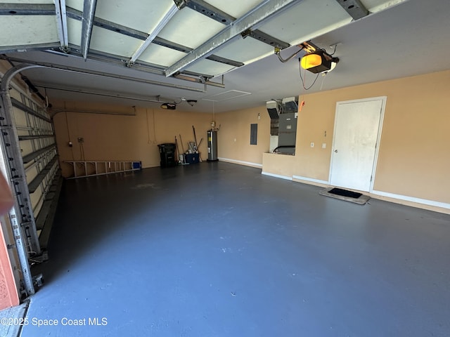 garage featuring electric water heater and a garage door opener