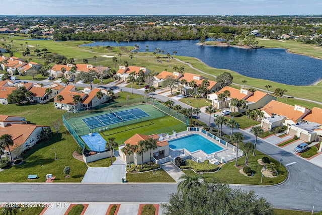 birds eye view of property featuring a water view