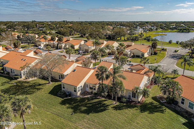 drone / aerial view featuring a water view