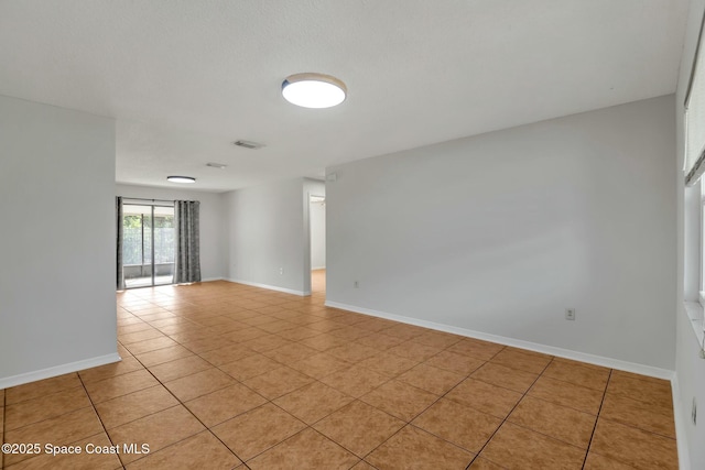 view of tiled empty room