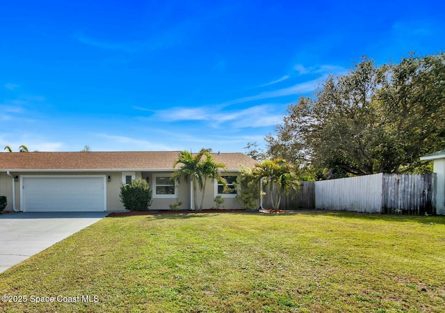 ranch-style home with a garage and a front lawn