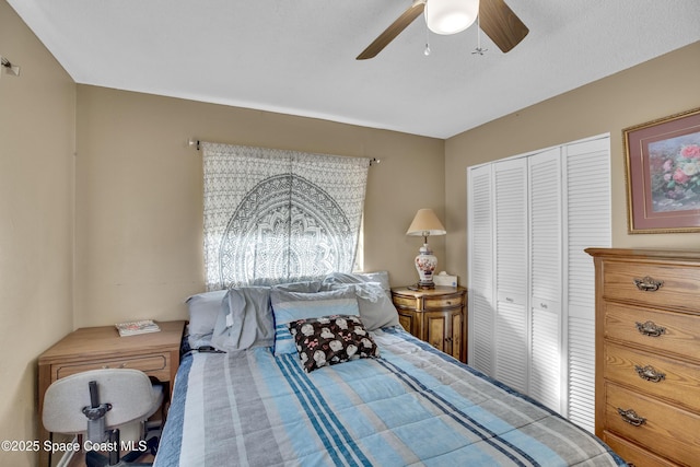 bedroom featuring a closet and ceiling fan