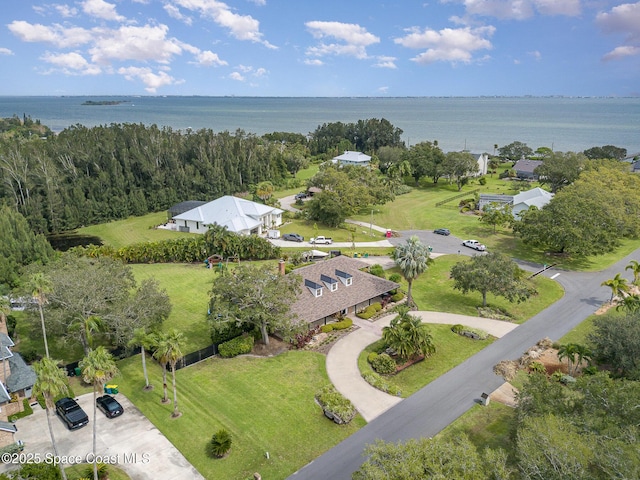 bird's eye view with a water view