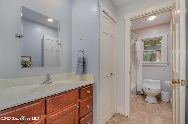 full bathroom featuring tile patterned flooring, shower / bath combo, vanity, and toilet