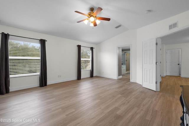 interior space with ceiling fan, light hardwood / wood-style floors, and vaulted ceiling