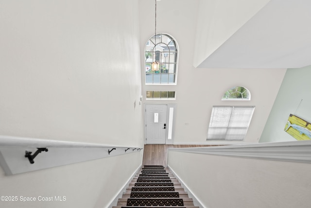 stairway with a high ceiling