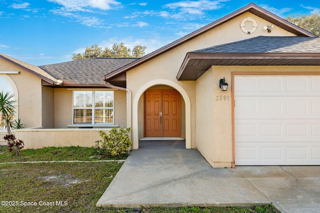 entrance to property with a garage