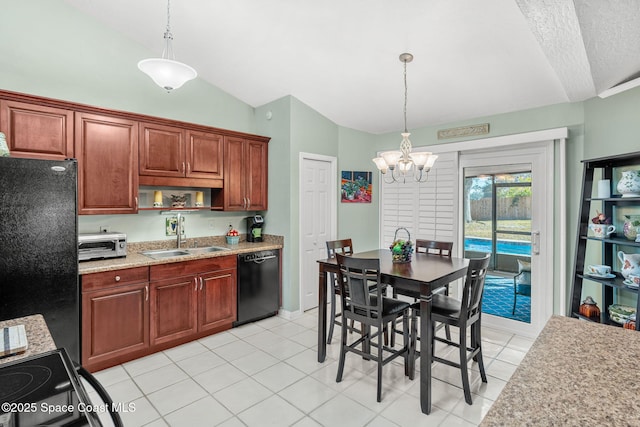 kitchen with sink, hanging light fixtures, lofted ceiling, and black appliances