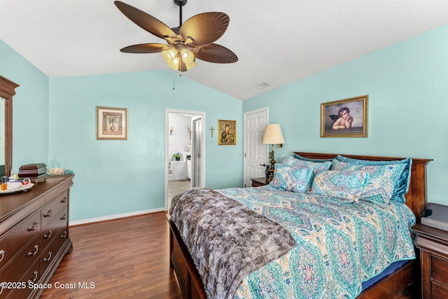 bedroom with dark hardwood / wood-style floors, vaulted ceiling, and ceiling fan