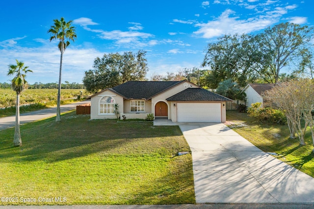 ranch-style home featuring a garage and a front lawn