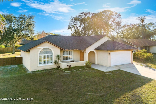 single story home with a front lawn and a garage