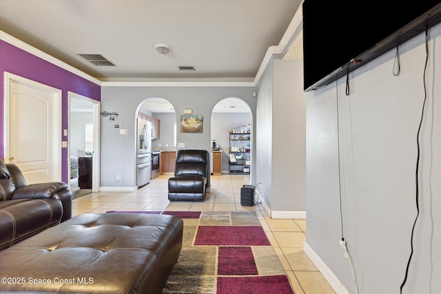 tiled living room with ornamental molding