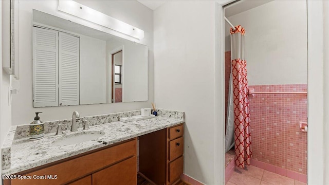 bathroom with vanity, tile patterned floors, and a shower with shower curtain