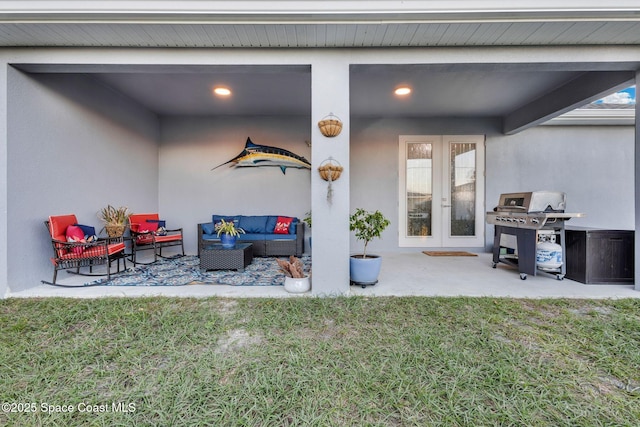 view of patio / terrace with a grill, french doors, and an outdoor hangout area