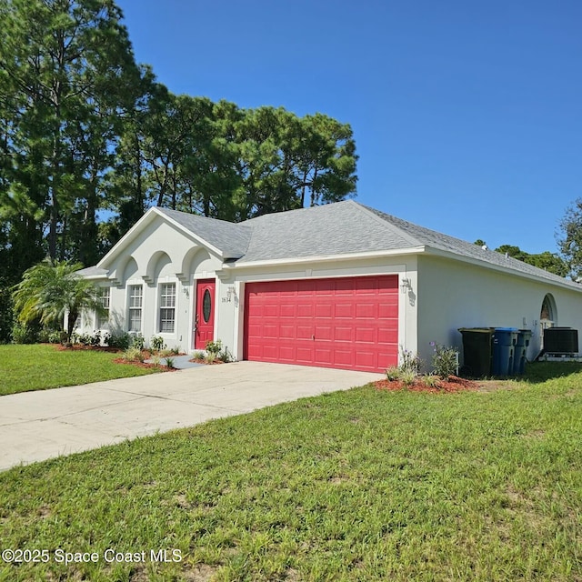 ranch-style house featuring central AC, a front yard, and a garage