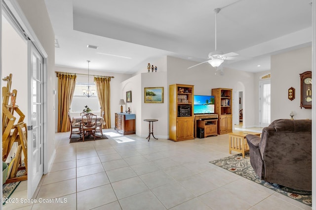 living room featuring ceiling fan and light tile patterned floors