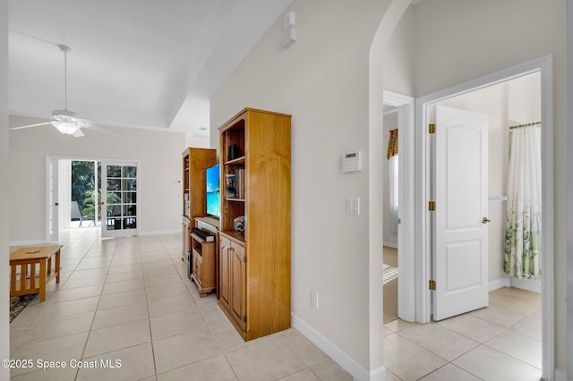 hallway featuring light tile patterned flooring