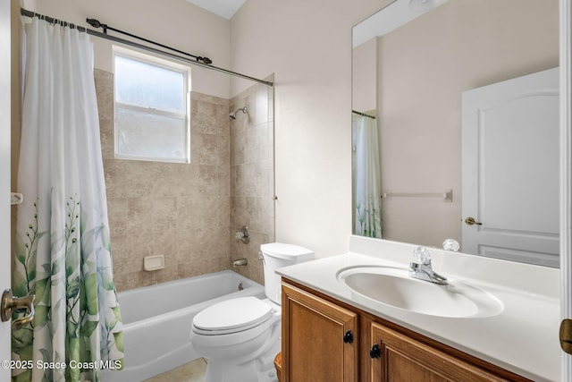 full bathroom featuring vanity, toilet, and shower / bath combo with shower curtain