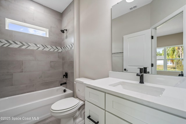 228 Dunlap Ave SE, Palm Bay, FL 32909 - bathroom featuring toilet, visible vents, plenty of natural light, and bathtub / shower combination