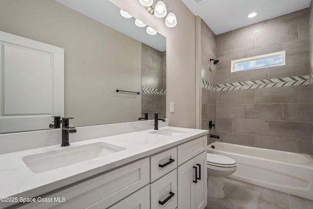 228 Dunlap Ave SE, Palm Bay, FL 32909 - bathroom featuring a sink, bathtub / shower combination, toilet, and double vanity