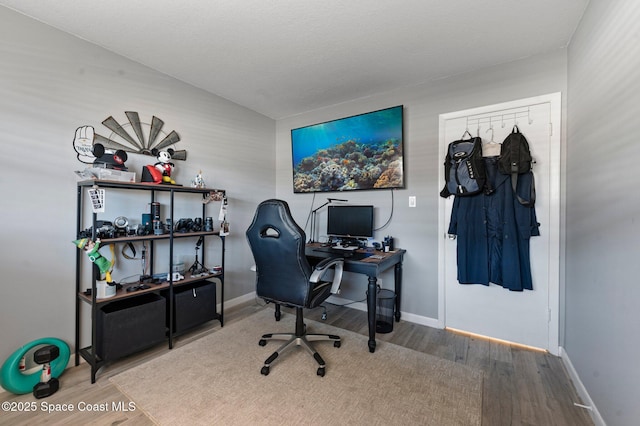 home office featuring hardwood / wood-style flooring