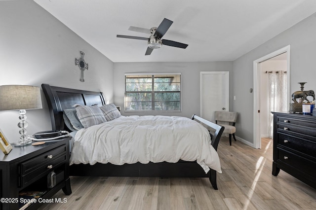 bedroom featuring ceiling fan and light wood-type flooring