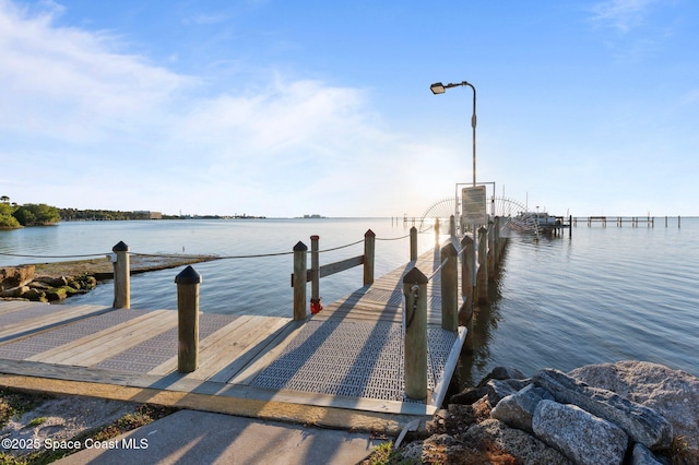 view of dock with a water view