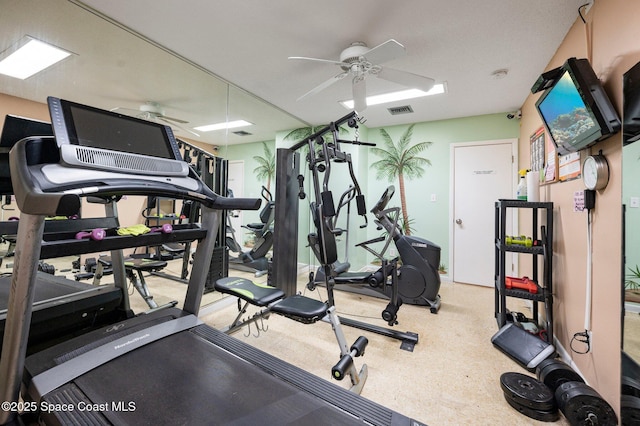 gym with ceiling fan