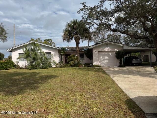 single story home featuring a carport, a garage, and a front lawn